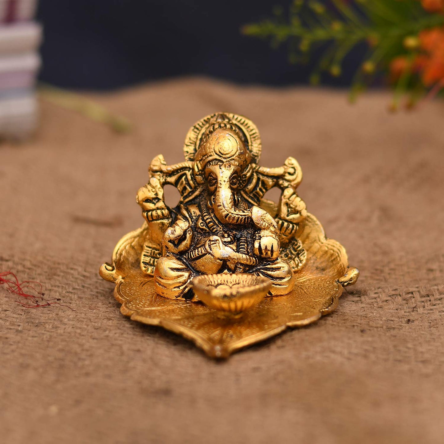 Ganesh Idol on Leaf - Lord Ganesha with Diya - Metal Hand Craved for Home Decorative Gift Puja Gifts Corporate