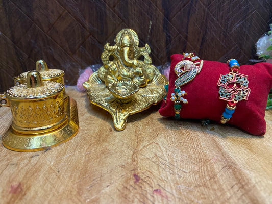 Rakhi combo - Ganesh diya, 2 rakhi and roli chawal box